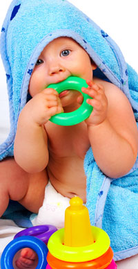Baby chewing a toy